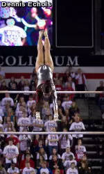 Kat Ding tied for second on bars.