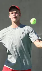 Ben Wagland was a quick winner in singles, tying the score 1-1 at that point.