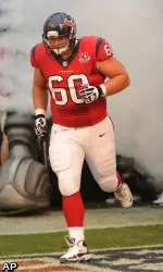 Houston Texans' Ben Jones (60) comes onto the field during team introductions before an NFL football game against the Baltimore Ravens, Sunday, Oct. 21, 2012, in Houston. (AP Photo/Dave Einsel)