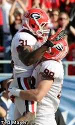 Arthur Lynch (88) celebrates with Chris Conley (31)