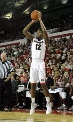 Kenny Gaines (above) and Charles Mann combined for 44 points.