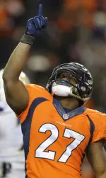 Denver Broncos running back Knowshon Moreno reacts after scoring a touchdown on a three-year run against the San Diego Chargers in the fourth quarter of an NFL AFC division playoff football game, Sunday, Jan. 12, 2014, in Denver. (AP Photo/Jack Dempsey)