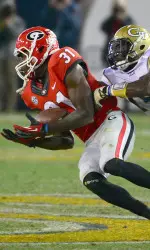 Chris Conley hauls in a catch versus GT last year.