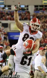 David Andrews celebrates a touchdown with Michael Bennett.