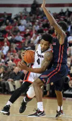 Charles Mann scored all 12 of his points in the second half to help lead the Bulldogs to their third straight SEC victory, topping Ole Miss 69-64 on Tuesday night.