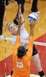 A triplet, Megan Spencer is familiar with a family feel around her volleyball teammates.