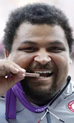 Former Bulldog Reese Hoffa, a three-time Olympian, is one of the track and field team's new volunteer coaches. (AP Photo)