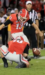 Marshall Morgan (#13) kicks the ball in the 2nd-half of the Missouri game.