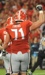 Senior OT John Theus