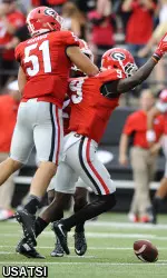 Reggie Wilkerson celebrates after an interception during the second half.