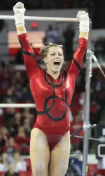 Brittany Rogers and the Gymdogs had a lot of reason to be excited after the uneven bars. (Photo by by Emily Selby)
