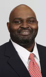 Director of player development Jonas Jennings spent last Sunday giving away turkeys in College Park.