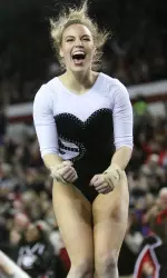 Mary Beth Box celebrates after her floor routine. (Photo by Emily Selby)