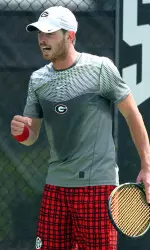 Senior Austin Smith delivered a win for the Bulldogs at the No. 1 court on Sunday.