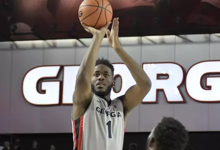 Georgia forward Yante Maten (1) hits a there point shot during the Bulldogs' game against Alabama in Stegeman Coliseum on Saturday, Jan. 6, 2018 (Photo by John Kelley/UGA)