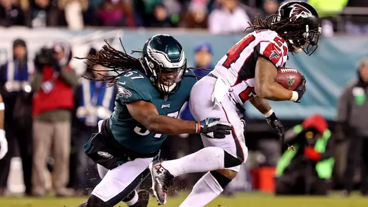 Jan 13, 2018; Philadelphia, PA, USA; Atlanta Falcons running back Devonta Freeman (24) runs the ball against Philadelphia Eagles linebacker Dannell Ellerbe (57) during the third quarter in the NFC Divisional playoff game at Lincoln Financial Field. Mandatory Credit: Bill Streicher-USA TODAY Sports