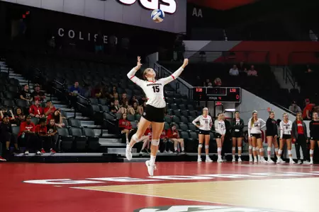Georgia defensive specialist Sydney Gilliam (15) serves the ball during a volleyball match between The University of Georgia and Louisiana State University in Stegeman Coliseum in Athens, Ga., on Friday, Sept., 21, 2018. (Photo by Kristin M. Bradshaw)