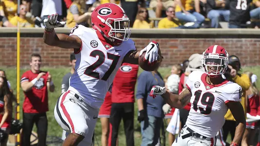 Georgia defensive back Eric Stokes (27)Georgia defensive back Eric Stokes celebrates after he returned a blocked a punt for a touchdown during the first half  of an NCAA college football game against Missouri, Saturday, Sept 22, 2018, in Columbia, Mo. (Curtis Compton/Atlanta Journal-Constitution via AP)