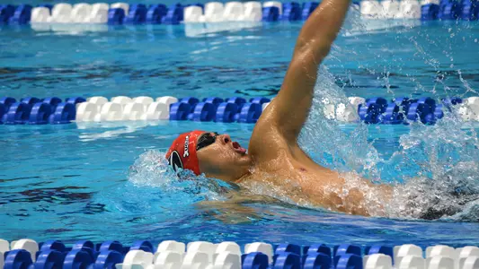 Javier Acevedo competes in the backstroke.