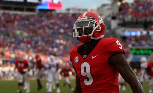 Georgia receiver Jeremiah Holloman (9) celebrates a his second touchdown of the game during an NCAA football game between the University of Georgia Bulldogs and the University of Florida Gators in TIAA Bank Field in Jacksonville, Fl., on Saturday, Oct. 27, 2018. (Photo by Lauren Tolbert)