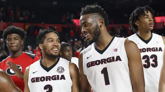 Georgia guard Juwan Parker (3) and forward Yante Maten (1) celebrate with teammates after defeating Mississippi 71-60 during an NCAA college basketball game in Athens, Ga., Wednesday, Jan. 3, 2018. (Joshua L. Jones/Athens Banner-Herald via AP)
