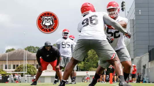 Georgia defensive line coach Tray Scott observes a drill during the Bulldogs' practice on the Woodruff Practice Fields in Athens, Ga., on Friday, Aug. 3, 2018. (Photo by Kristin M. Bradshaw)