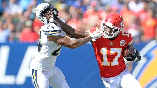 September 9, 2018; Carson, CA, USA; Kansas City Chiefs wide receiver Chris Conley (17) runs the ball against Los Angeles Chargers cornerback Trevor Williams (24) during the second half at StubHub Center. Mandatory Credit: Gary A. Vasquez-USA TODAY Sports