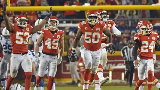 Kansas City Chiefs players celebrate after linebacker Justin Houston (50) recovered a ball fumbled by Indianapolis Colts quarterback Andrew Luck for a turnover, during the second half of an NFL divisional football playoff game in Kansas City, Mo., Saturday, Jan. 12, 2019. (AP Photo/Ed Zurga)
