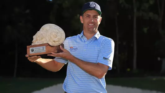 PLAYA DEL CARMEN, MEXICO - NOVEMBER 18: Brendon Todd of the United States celebrates with the trophy on the 18th green after winning the Mayakoba Golf Classic at El Camaleon Mayakoba Golf Course on November 18, 2019 in Playa del Carmen, Mexico. (Photo by Gregory Shamus/Getty Images)