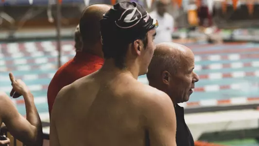 Swimming and diving head coach Jack Bauerle watches his team during Day 3 of the Tennessee Invitational.