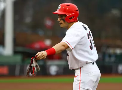 Frierson Files Georgia infielder Riley King (31) hands off his glove during Georgia baseball's season opener against the University of Dayton in Athens, Ga., on Friday, Feb. 15, 2019. (Photo by Kristin M. Bradshaw)