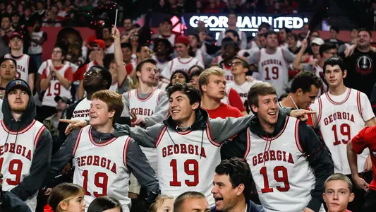 Fans celebrate during a men's basketball game between the University of Georgia and the University of Florida in Athens, Ga., on Saturday, Jan. 19, 2019. (Photo by Kristin M. Bradshaw)Fans celebrate during a men's basketball game between the University of Georgia and the University of Florida in Athens, Ga., on Saturday, Jan. 19, 2019. (Photo by Kristin M. Bradshaw)