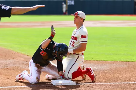 Georgia infielder Tucker Bradley (28) celebrates making it to third base during a baseball game between the University of Georgia and the University of Dayton in Athens, Ga., on Saturday, Feb. 16, 2019. (Photo by Kristin M. Bradshaw)