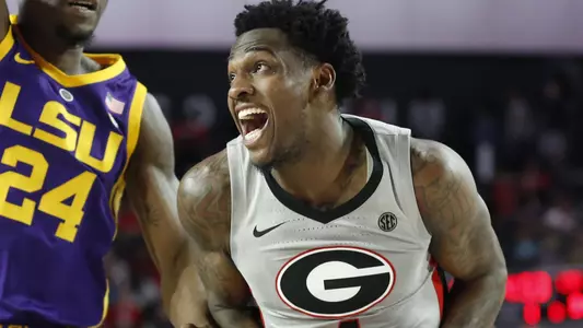 Georgia guard Tyree Crump (4) looks for an open shot while defended by LSU forward Emmitt Williams (24) during an NCAA college basketball game in Athens, Ga., Saturday, Feb. 16, 2019. (Joshua L. Jones/Athens Banner-Herald via AP)Georgia guard Tyree Crump (4) looks for an open shot while defended by LSU forward Emmitt Williams (24) during an NCAA college basketball game in Athens, Ga., Saturday, Feb. 16, 2019. (Joshua L. Jones/Athens Banner-Herald via AP)