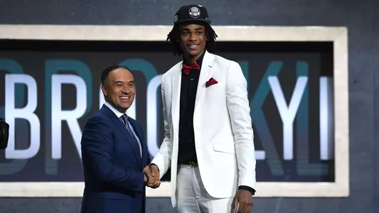 NEW YORK, NEW YORK - JUNE 20: Nicolas Claxton poses with NBA Deputy Commissioner Mark Tatum after being drafted with the 31st overall pick by the Brooklyn Nets during the 2019 NBA Draft at the Barclays Center on June 20, 2019 in the Brooklyn borough of New York City. NOTE TO USER: User expressly acknowledges and agrees that, by downloading and or using this photograph, User is consenting to the terms and conditions of the Getty Images License Agreement. (Photo by Sarah Stier/Getty Images)