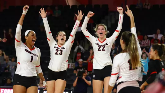 Georgia opposite hitter/middle blocker Kaylah House (1), Georgia outside hitter Kacie Evans (23), Georgia setter Meghan Donovan (22) after winning a match against NC State in Stegeman Coliseum in Athens, Ga., on Thursday, Sept. 19, 2019. (Photo by Tony Walsh)