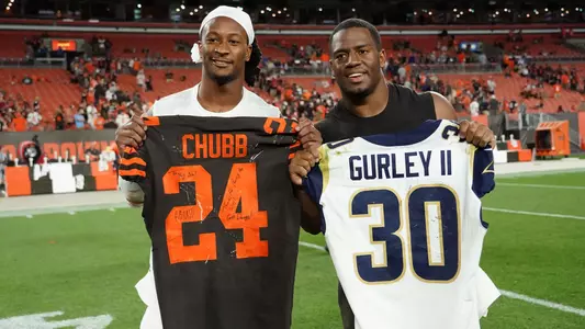 Los Angeles Rams running back Todd Gurley (left) and Cleveland Browns running back Nick Chubb pose after exchanging jerseys at FirstEnergy Stadium. The Rams defeated the Browns 20-13. Mandatory Credit: Kirby Lee-USA TODAY Sports