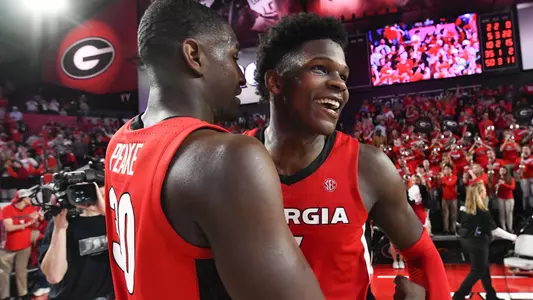 Georgia guard Anthony Edwards, right, and forward Mike Peake celebrate after an NCAA college basketball game against Auburn, Wednesday, Feb. 19, 2020, in Athens, Ga. Georgia won 65-55. (AP Photo/John Amis)Georgia guard Anthony Edwards, right, and forward Mike Peake celebrate after an NCAA college basketball game against Auburn, Wednesday, Feb. 19, 2020, in Athens, Ga. Georgia won 65-55. (AP Photo/John Amis)