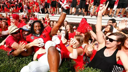 Running back Todd Gurley, fansATHENS, GA - SEPTEMBER 27: Todd Gurley #3 of the Georgia Bulldogs celebrates their 35-32 over the Tennessee Volunteers at Sanford Stadium on September 27, 2014 in Athens, Georgia. (Photo by Kevin C. Cox/Getty Images)