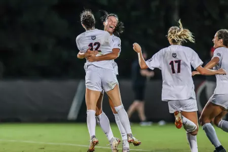Georgia forward Mollie Belisle (12) and Georgia midfielder Dani Murguia (4) during a match against Florida at the Turner Soccer Complex in Athens, Ga., on Thursday, Oct. 21 , 2021. (Photo by Mackenzie Miles)