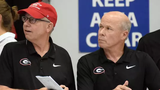 Georgia senior associate head coach Harvey Humphries and GeorgiaÕs Tom Cousins Swimming and Diving Head Coach Jack Bauerle during the NCAA Men's Swimming and Diving Championships in Minneapolis, Minn., on Friday, March 23, 2018. (Photo by Steven Colquitt)