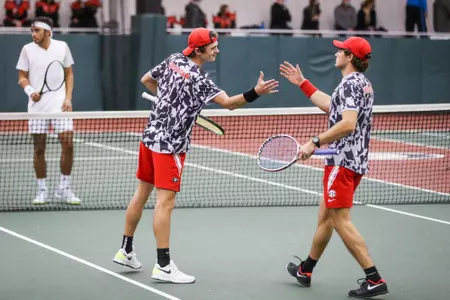 Georgia tennis player Tyler Zink, Georgia tennis player Trent Bryde during a match against Georgia at the Lindsey Hopkins Indoor Center on Feb. 5, 2021, in Athens, Georgia. (Photo by Chamberlain Smith)
