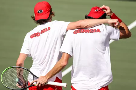 Georgia tennis player Erik Grevelius, Georgia tennis player Baptiste Anselmo during a match against Mississippi State at the Dan Magill Tennis Complex in Athens, Ga., on Sunday, Feb. 28, 2021. (Photo by Chamberlain Smith)