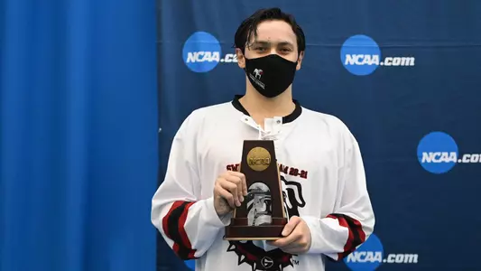 Georgia swimmer Luca Urlando stands on the podium at the 2021 NCAA Men's Swimming & Diving Championships.