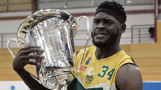 Derek Ogbeide celebrates after winning Cyprus OPAP League Championship in 2021.