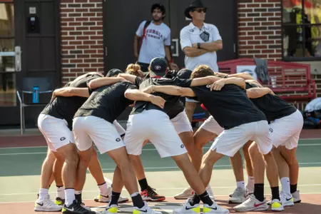 UGA Tennis Team huddle againt the University of Kentucky at Dan Magill Tennis Complex in Athens, GA (Photo by Jack Casey)