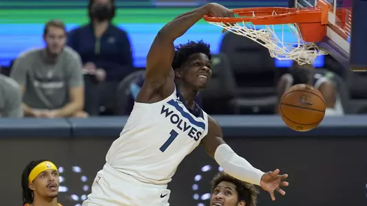 Minnesota Timberwolves guard Anthony Edwards (1) dunks against the Golden State Warriors during the first half of an NBA basketball game in San Francisco, Monday, Jan. 25, 2021. (AP Photo/Jeff Chiu)