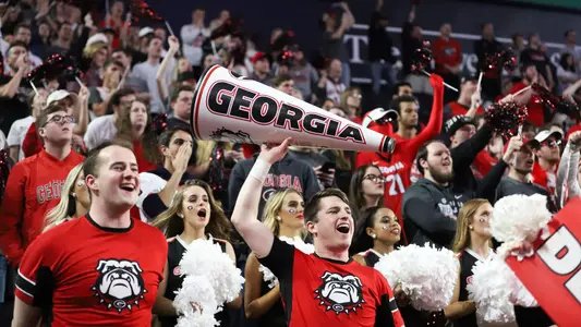 Fans cheer on the dawgs during a game between the University of Georgia and the University of Texas Austin in Stegeman Coliseum on Saturday, Jan. 26, 2019. (Photo by Lauren Tolbert)
