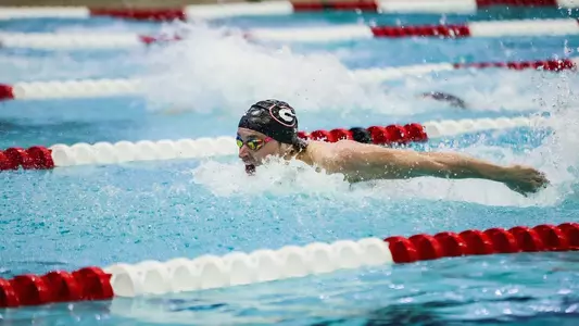 Luca Urlando swims for Georgia against Tennessee.