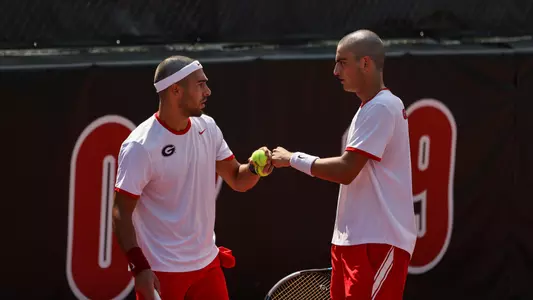 Georgia tennis players Filipe Costa and Teodor Giusca during the Southern Intercollegiate Championships against Texas at the Dan Magill Tennis Complex in Athens, Ga., on Friday, Sept. 16, 2022. (Photo by Kayla Renie)